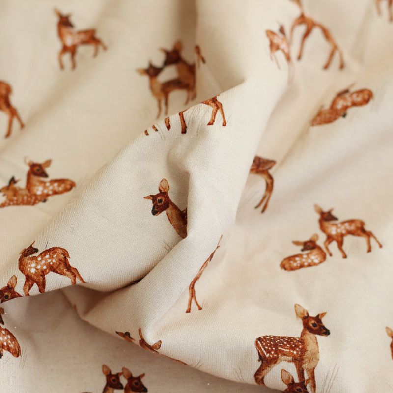 Bichette - Jersey coton à motif biches sur fond beige