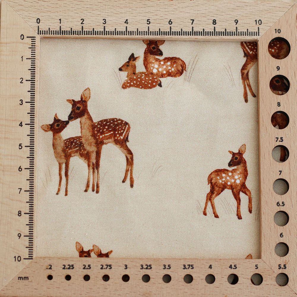 Bichette - Jersey coton à motif biches sur fond beige