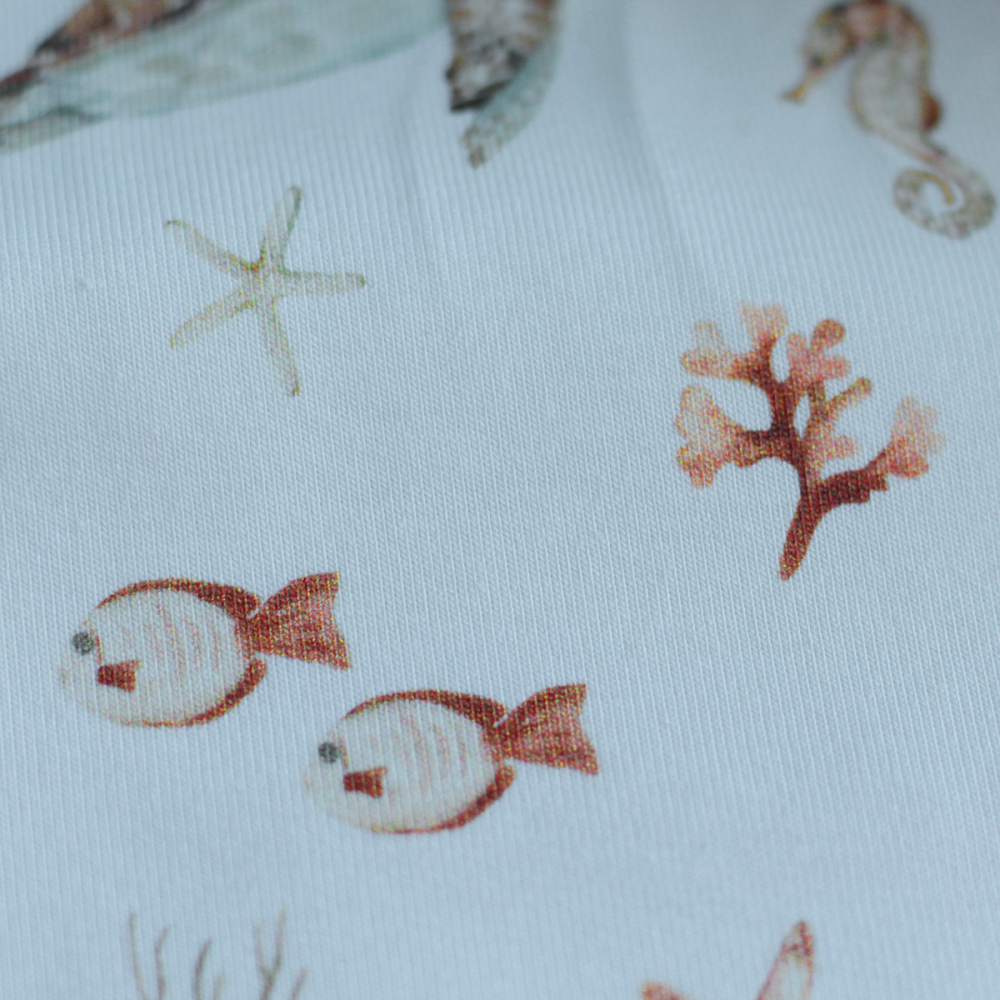 Jersey coton à motifs tortues ocre