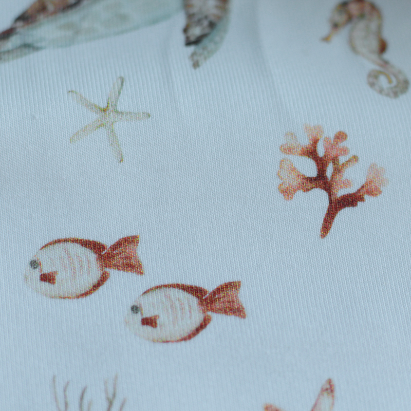 Jersey coton à motifs tortues ocre