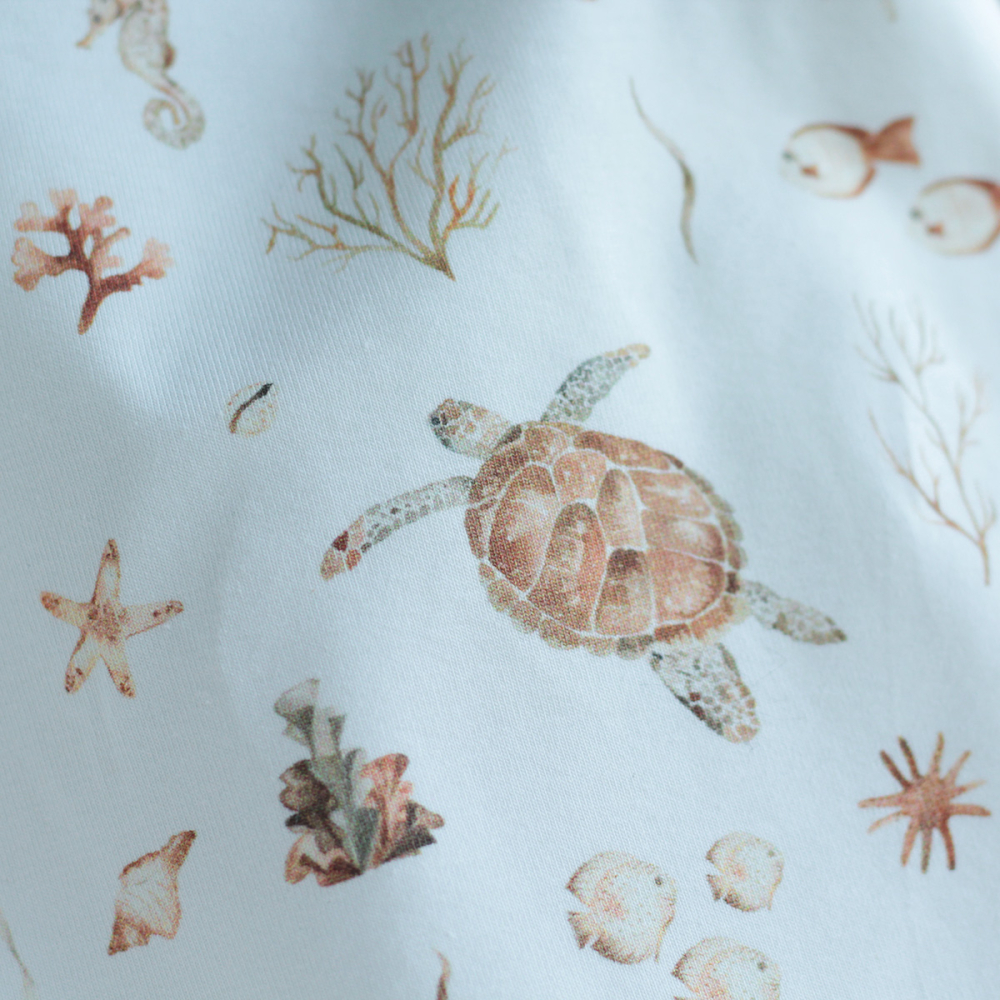 Jersey coton à motifs tortues ocre