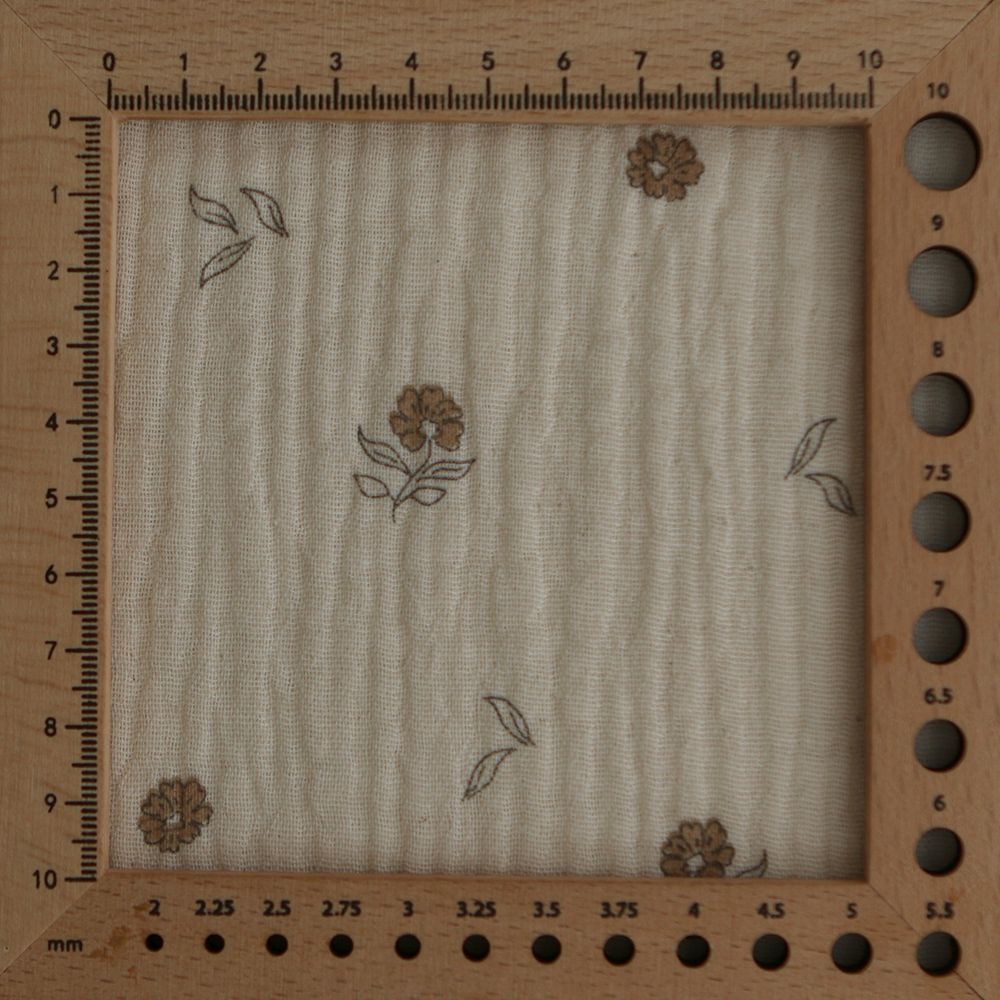 Aïna - Double gaze coton BIO motif fond écru camel Aïna - Double gaze coton BIO motif fond écru camel