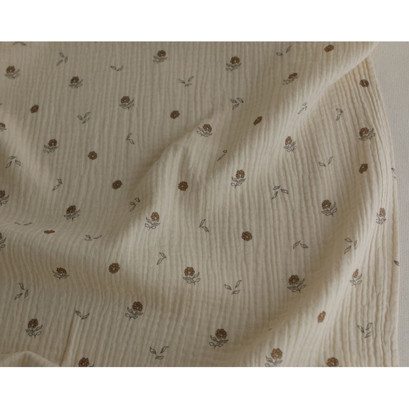 Aïna - Double gaze coton BIO motif fond écru camel Aïna - Double gaze coton BIO motif fond écru camel