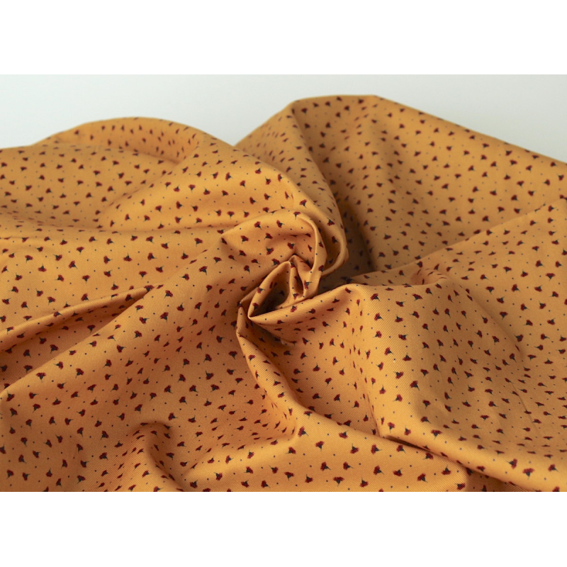 Tissu sergé / twill de coton organique imprimé fond moutarde x1m Tissu sergé / twill de coton organique imprimé fond moutarde x1m