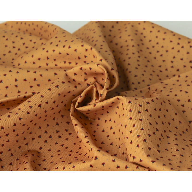 Tissu sergé / twill de coton organique imprimé fond moutarde x1m Tissu sergé / twill de coton organique imprimé fond moutarde x1m