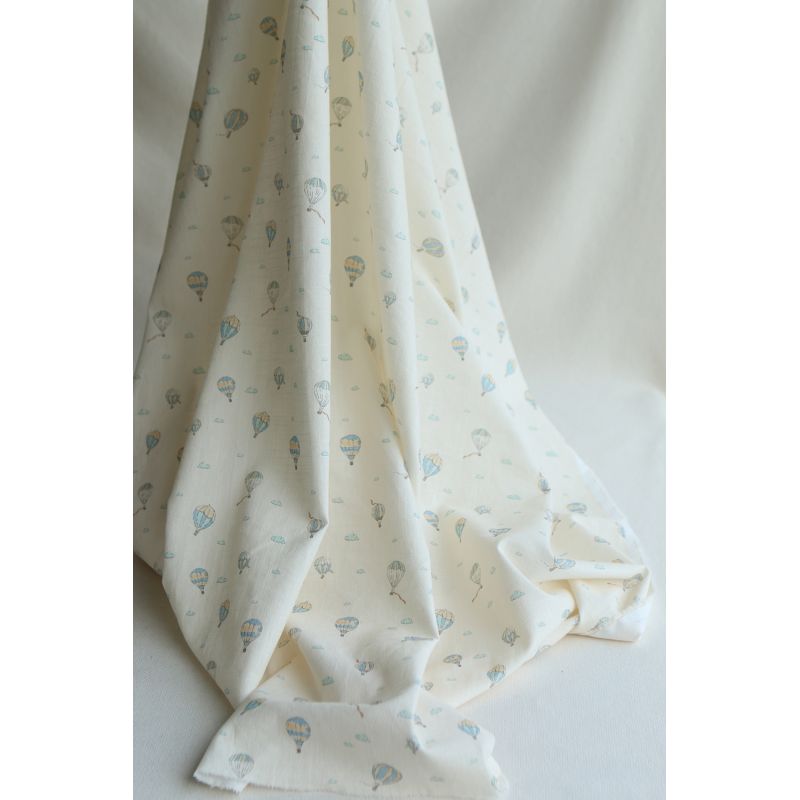 Fergusson - Coton lavé bio coloris vanille motif montgolfière Fergusson - Coton lavé bio coloris vanille motif montgolfière