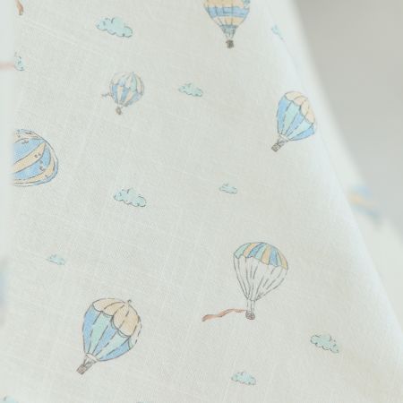 Fergusson - Coton lavé bio coloris vanille motif montgolfière Fergusson - Coton lavé bio coloris vanille motif montgolfière