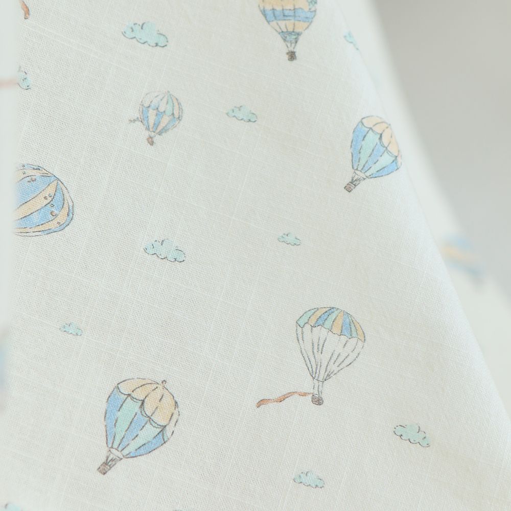 Fergusson - Coton lavé bio coloris vanille motif montgolfière Fergusson - Coton lavé bio coloris vanille motif montgolfière