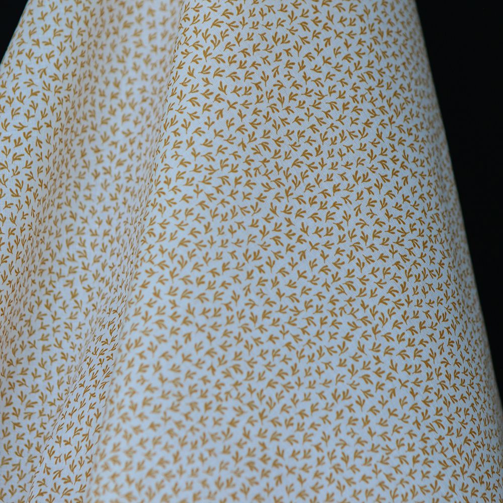 Cleo - Batiste de coton douce petit motif moutarde Cleo - Batiste de coton douce petit motif moutarde