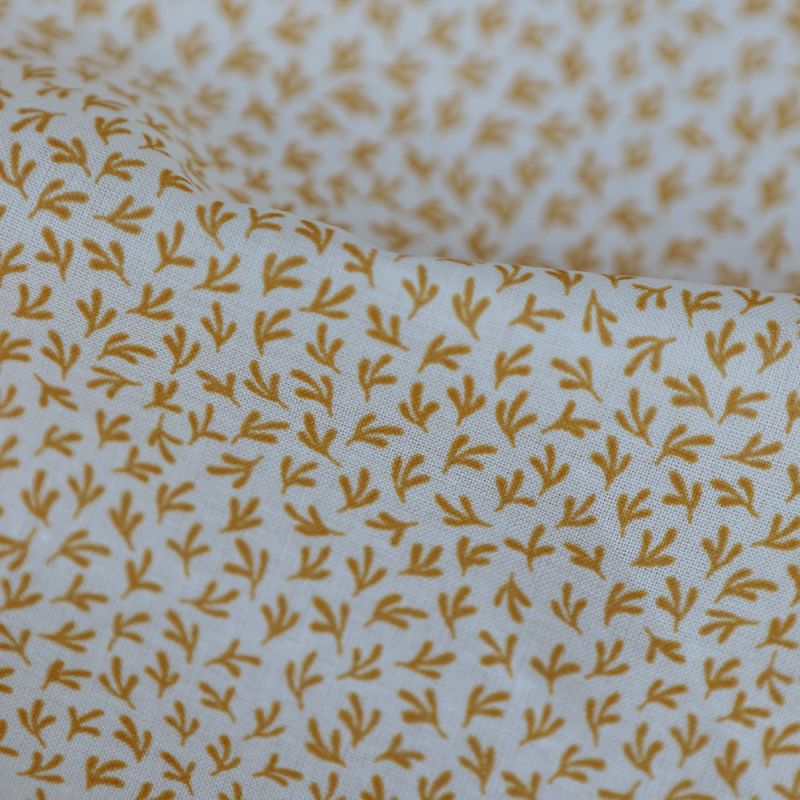 Cleo - Batiste de coton douce petit motif moutarde Cleo - Batiste de coton douce petit motif moutarde