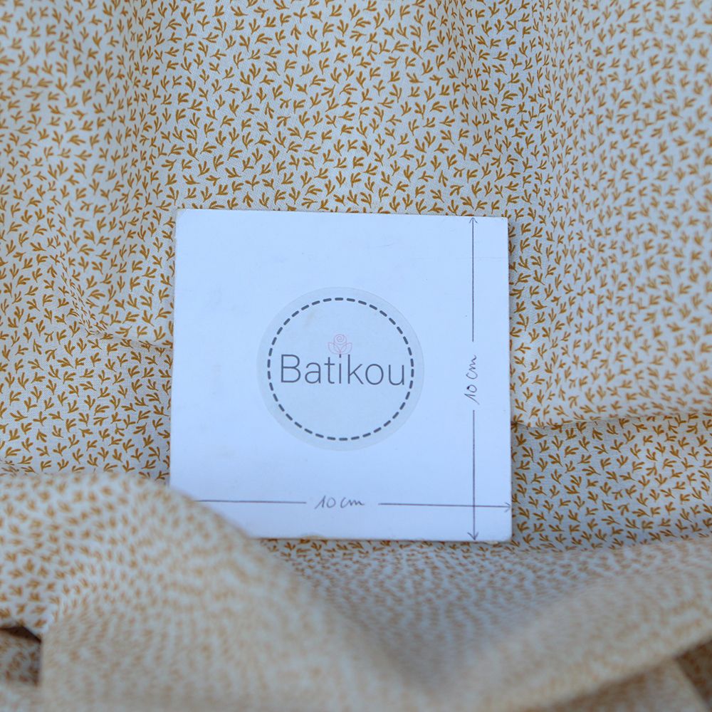 Cleo - Batiste de coton douce petit motif moutarde Cleo - Batiste de coton douce petit motif moutarde