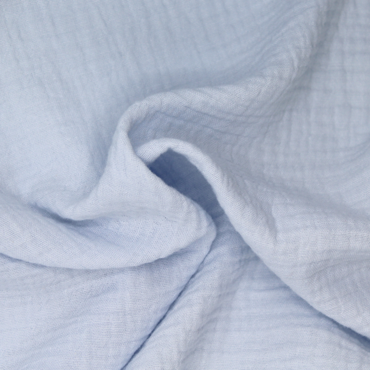 Double gaze de coton BIO unie bleu poudré Double gaze de coton BIO unie bleu poudré