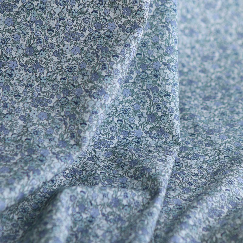 Opheline - Popeline douce coton organique fleuri bleu Opheline - Popeline douce coton organique fleuri bleu