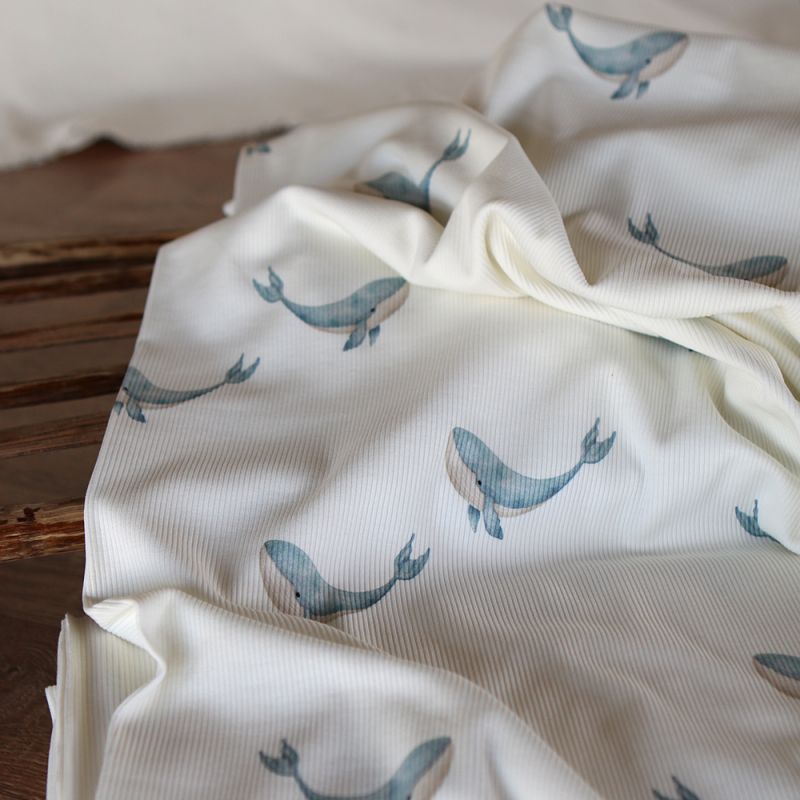 Jersey coton côtes fines à motif baleines bleu orage