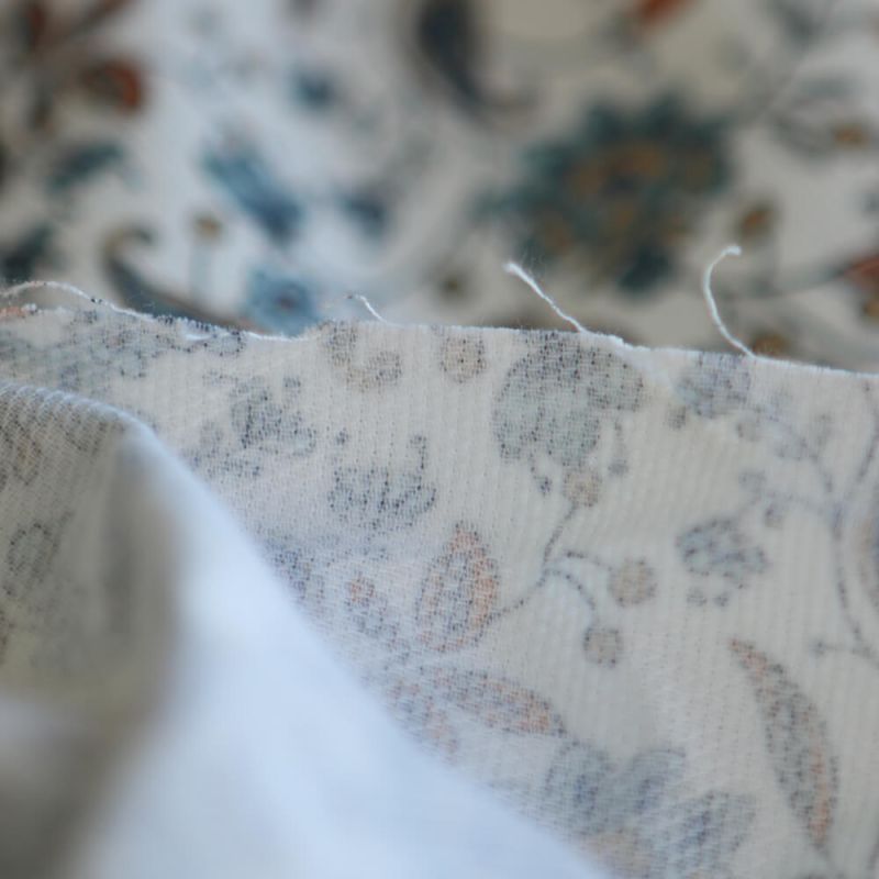 Théa - Piqué de coton organique gratté imprimé fleuri