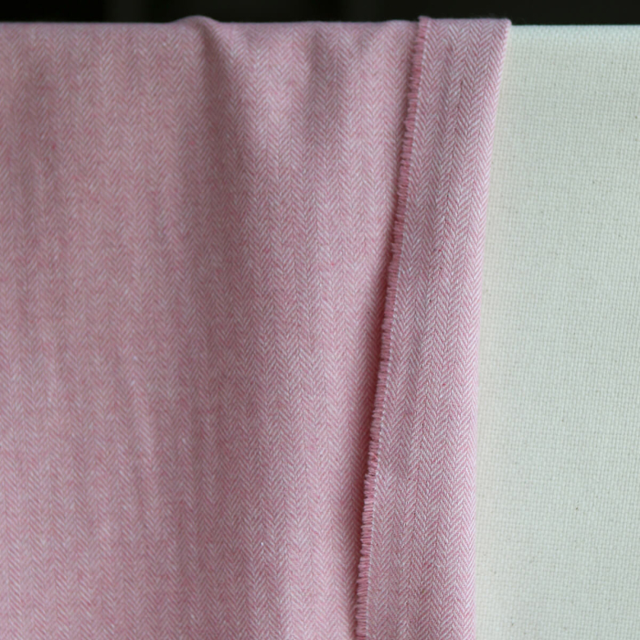Tissu chevrons texturé coton / laine coloris Rose tendre