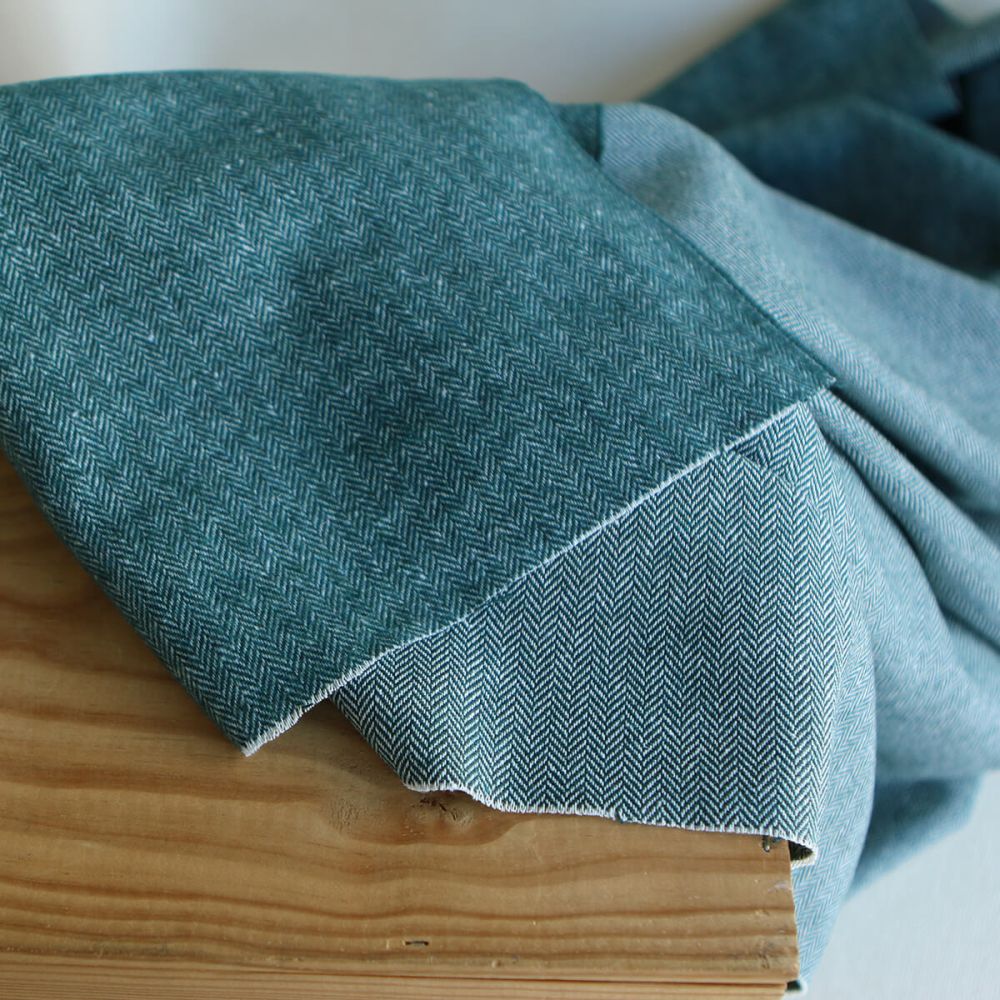 Tissu chevrons texturé coton / laine coloris Pétrole