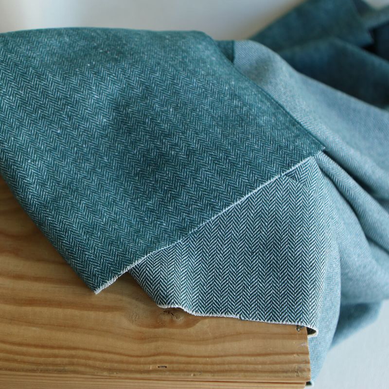 Tissu chevrons texturé coton / laine coloris Pétrole