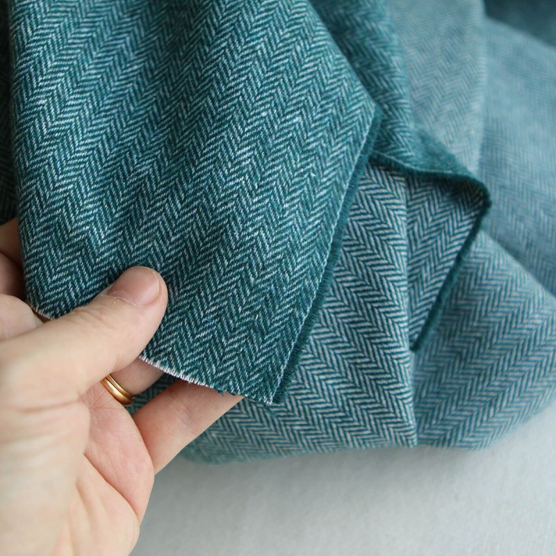 Tissu chevrons texturé coton / laine coloris Pétrole