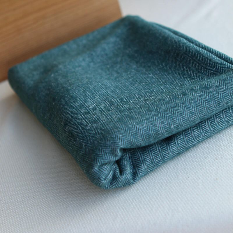 Tissu chevrons texturé coton / laine coloris Pétrole