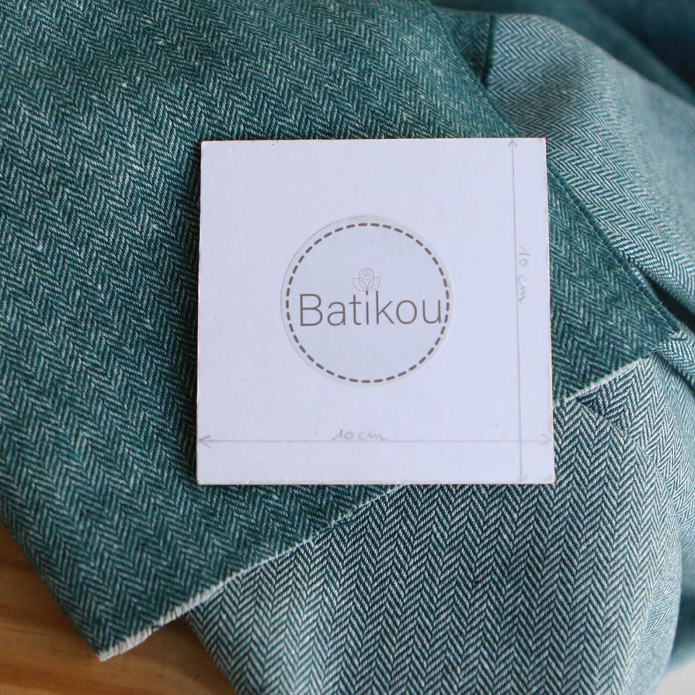 Tissu chevrons texturé coton / laine coloris Pétrole