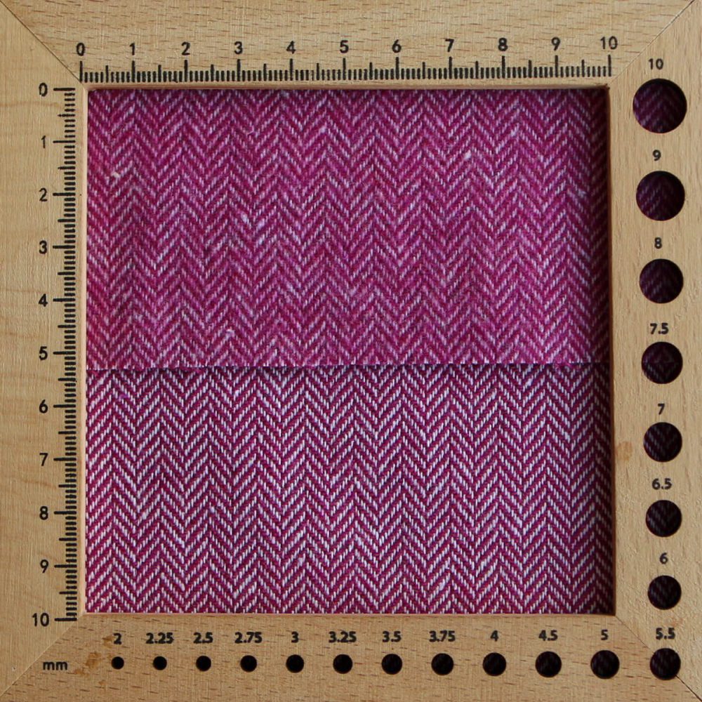 Tissu chevrons texturé coton / laine coloris framboise