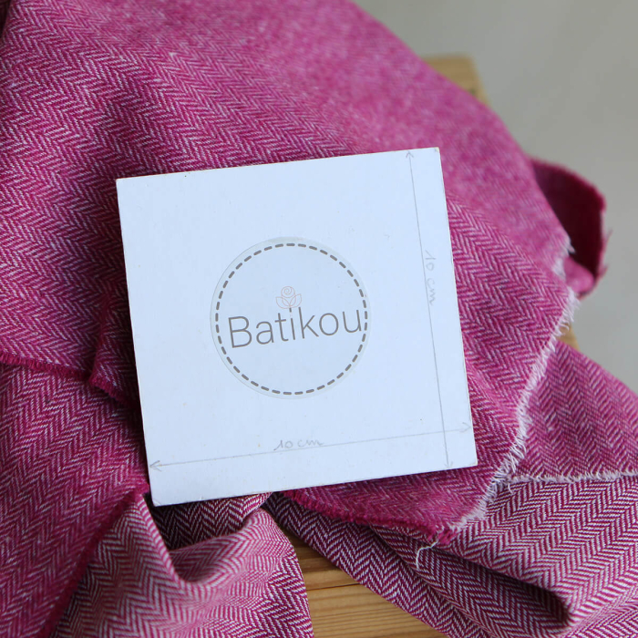 Tissu chevrons texturé coton / laine coloris framboise