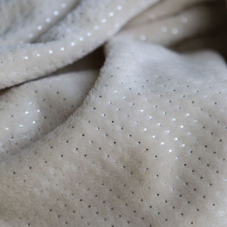 Polaire douce beige motif pois argentés