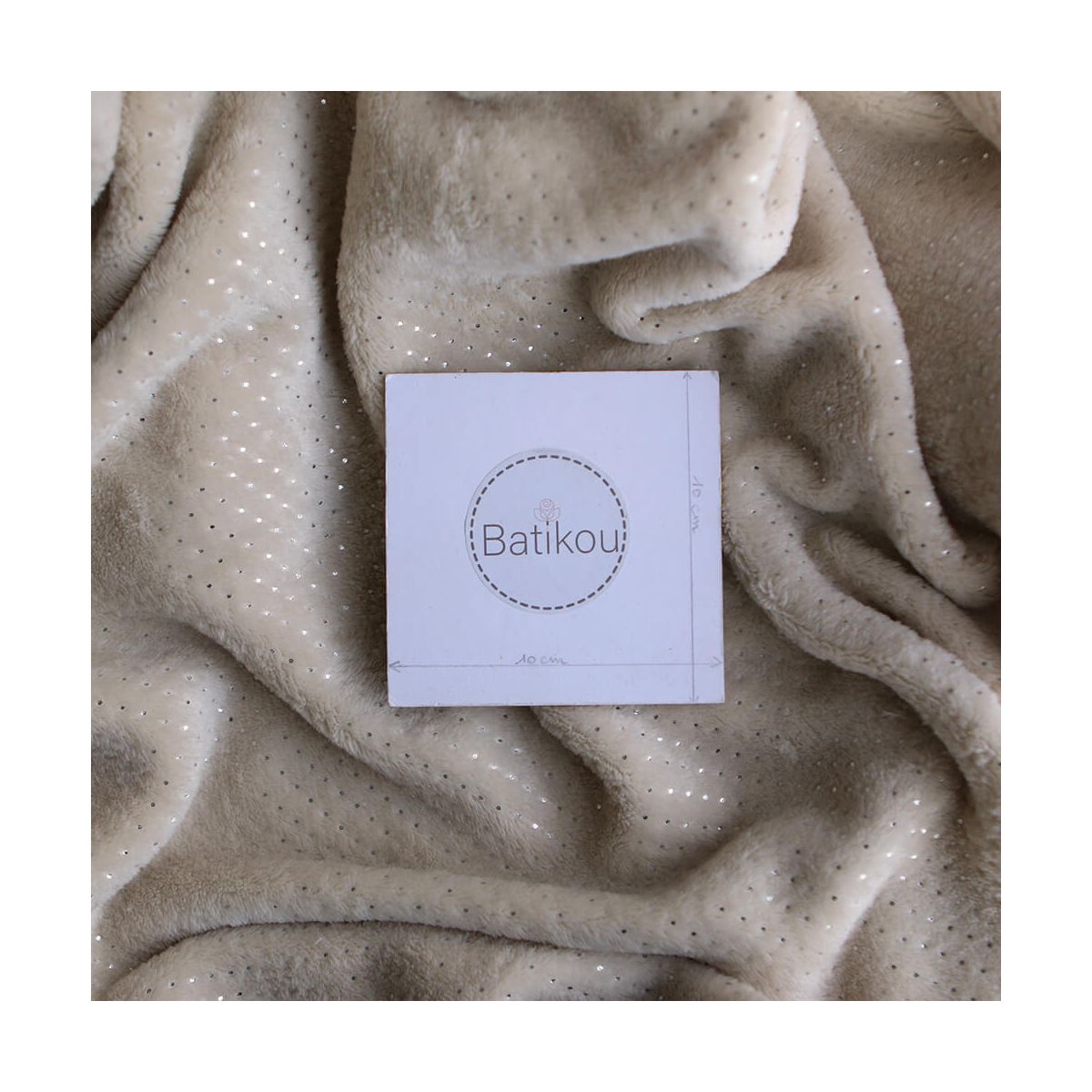 Polaire douce beige motif pois argentés