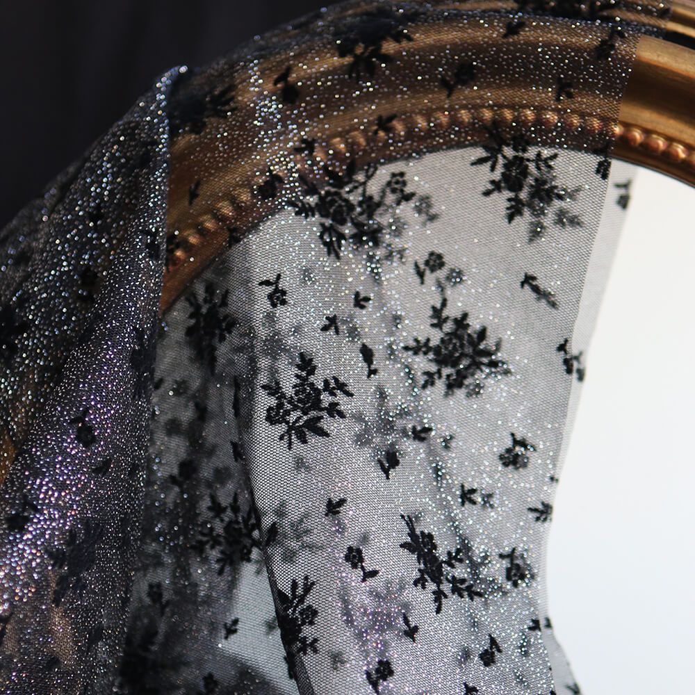 Tulle souple Made in France noir / argenté floqué fleurs velours noir