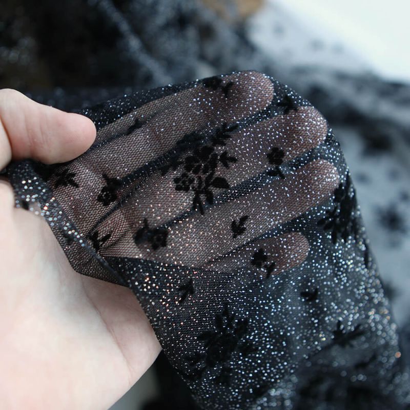 Tulle souple Made in France noir / argenté floqué fleurs velours noir