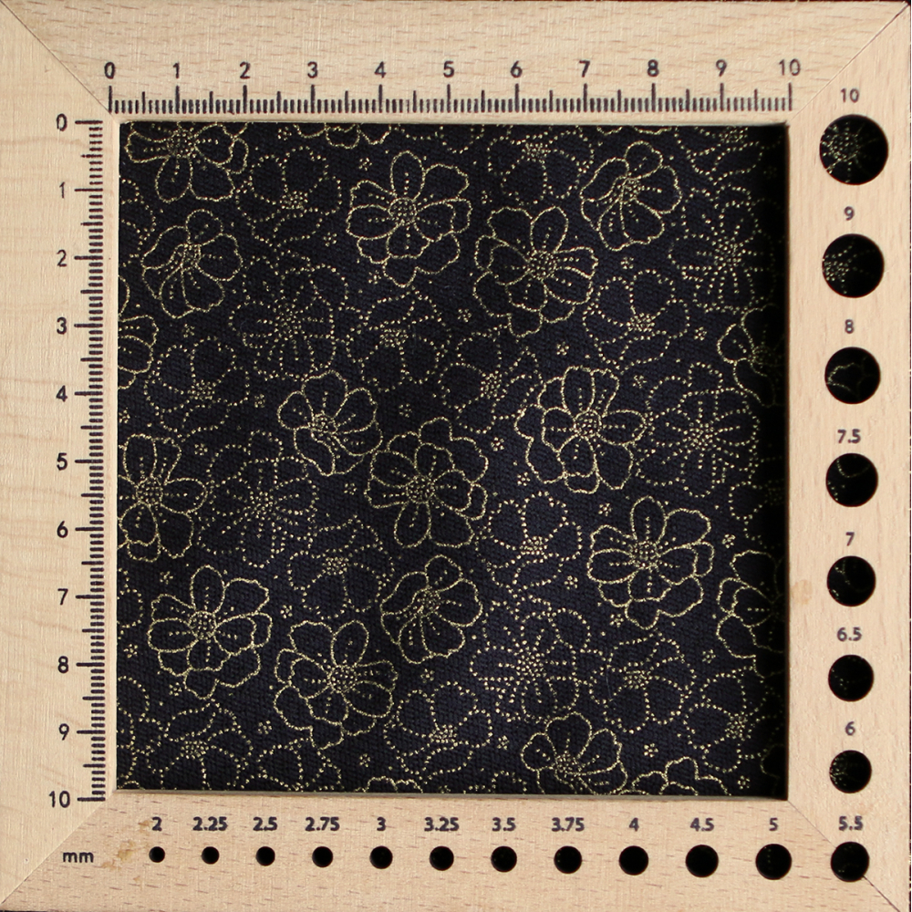 Coton viscose motif doré fond noir