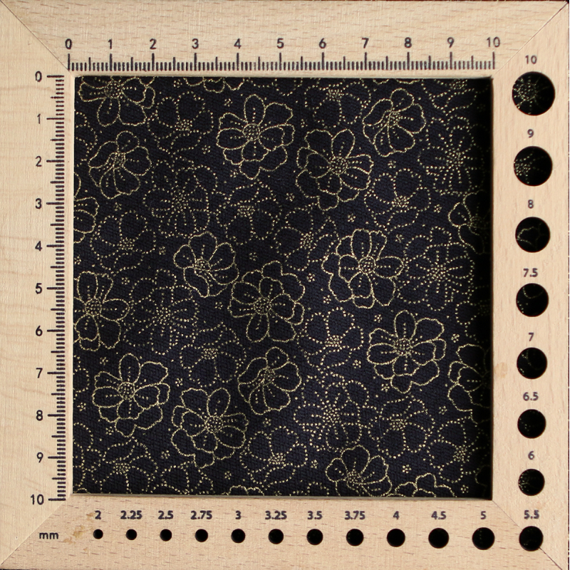 Coton viscose motif doré fond noir