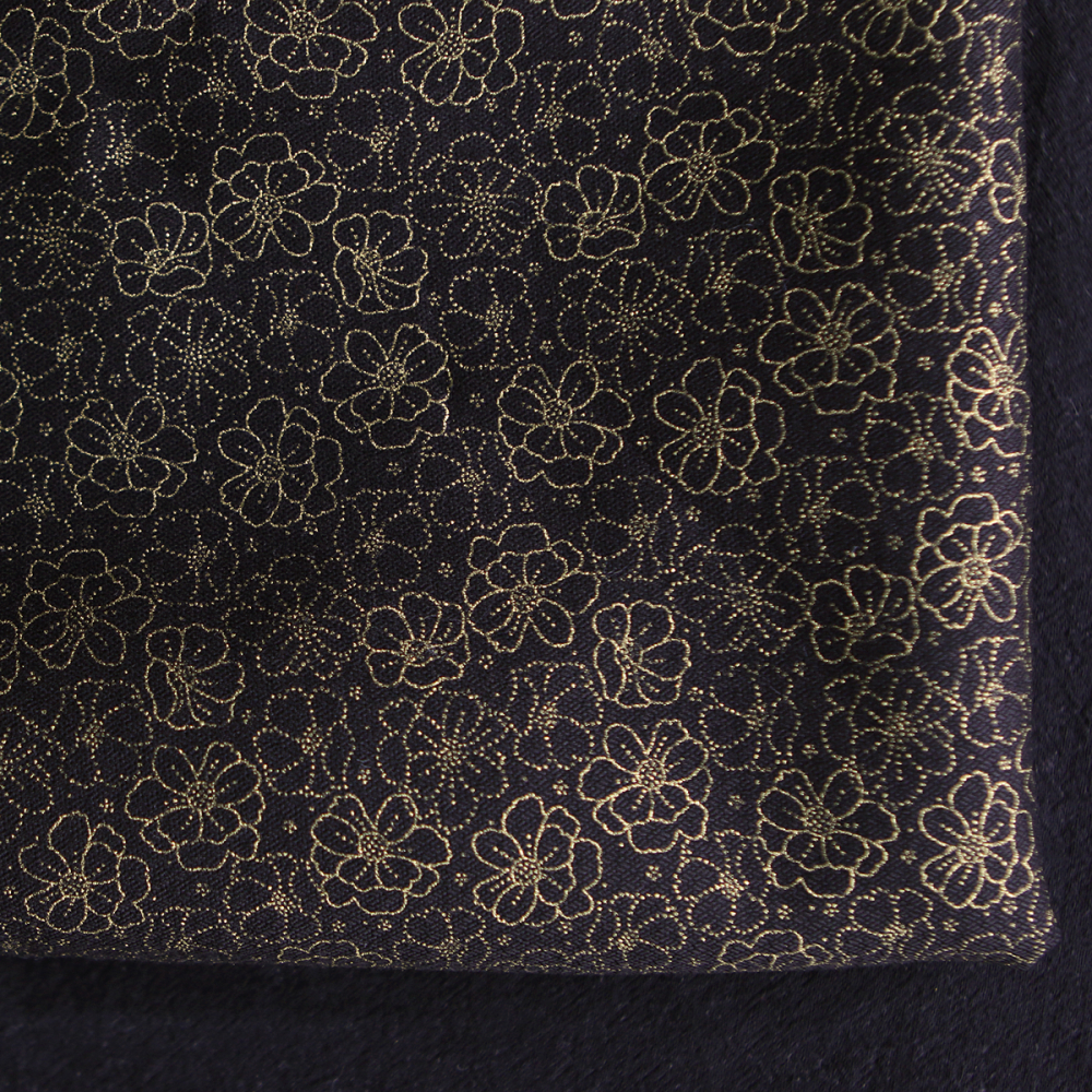 Coton viscose motif doré fond noir
