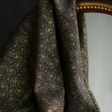 Coton viscose motif doré fond noir
