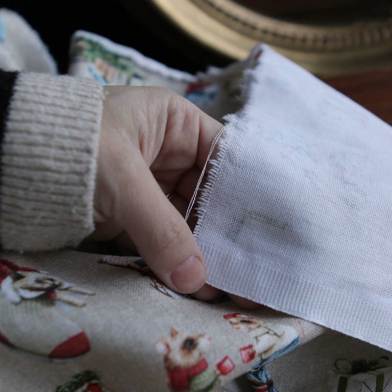 Toile de coton canvas motif animaux de noël fond beige