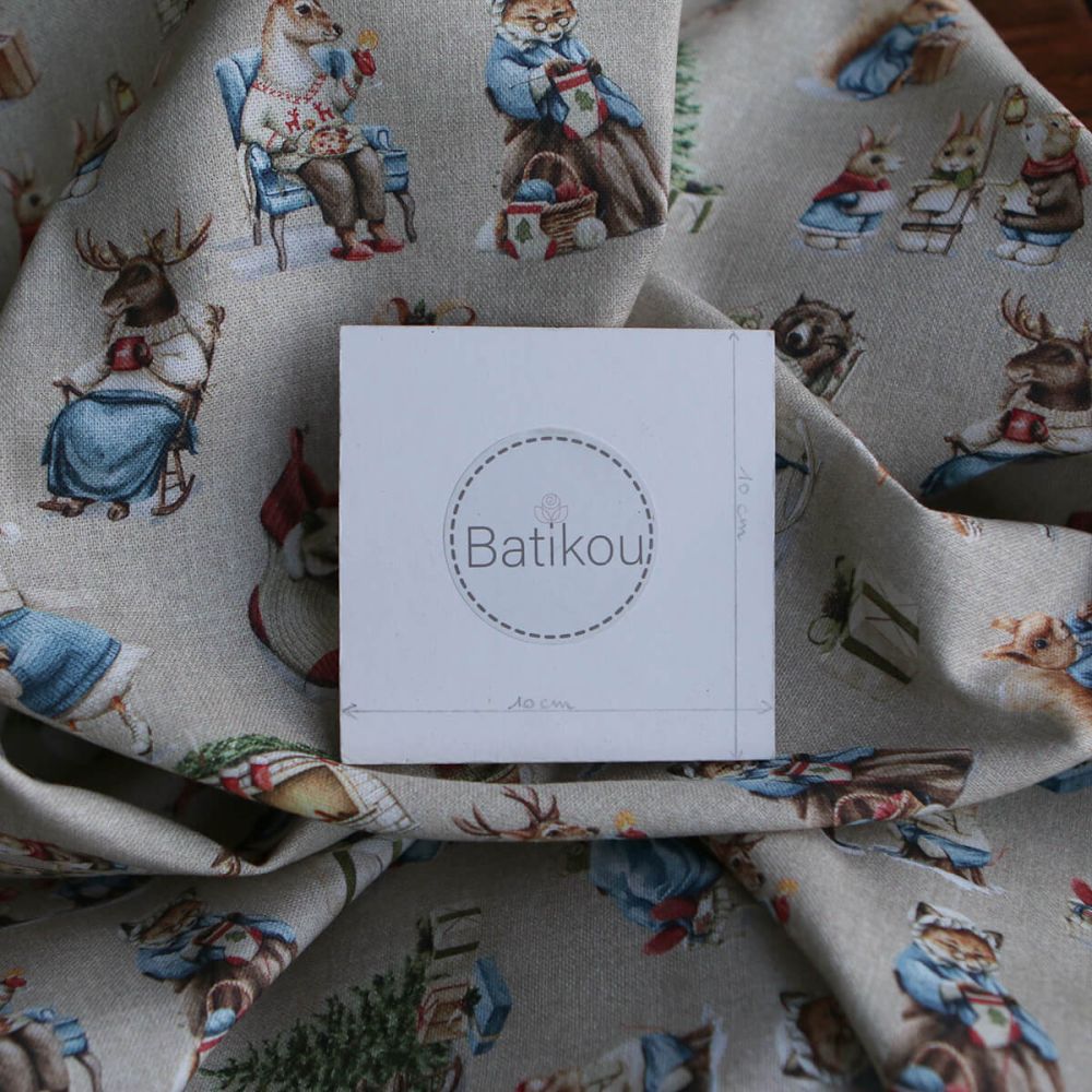 Toile de coton canvas motif animaux de noël fond beige