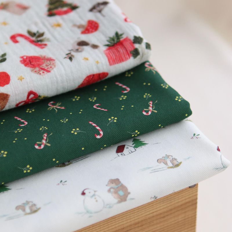 Tissu sergé de coton organique fond vert imprimé cannes à sucre