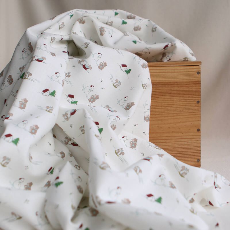Tissu sergé de coton organique imprimé personnages d'hiver