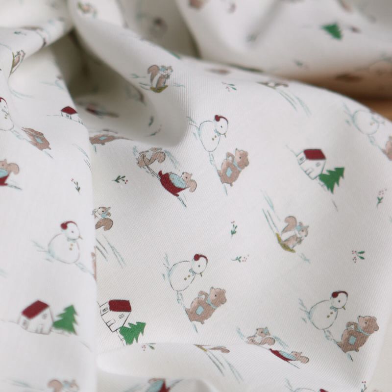 Tissu sergé de coton organique imprimé personnages d'hiver