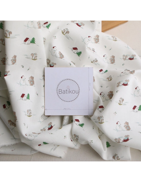 Tissu sergé de coton organique imprimé personnages d'hiver