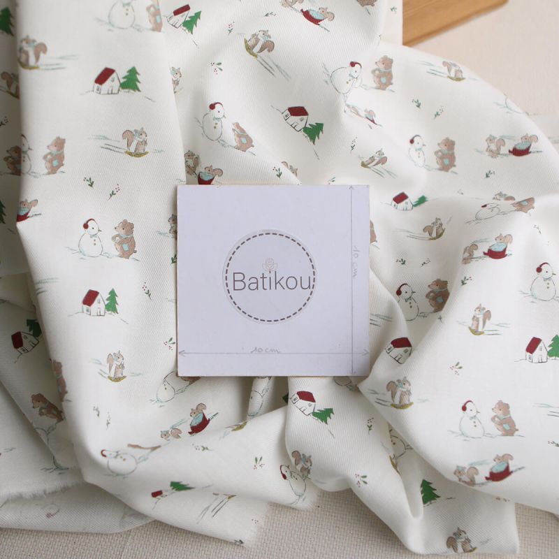 Tissu sergé de coton organique imprimé personnages d'hiver