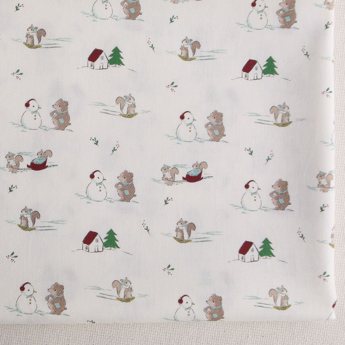 Tissu sergé de coton organique imprimé personnages d'hiver