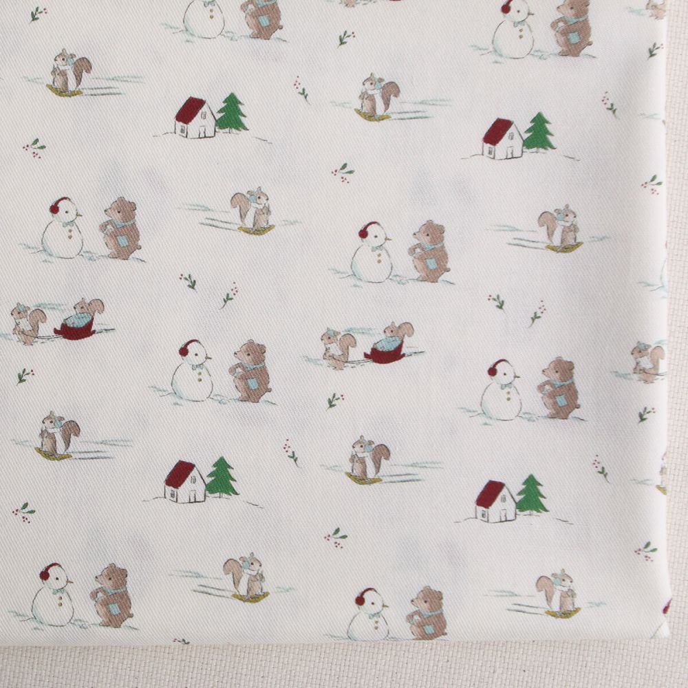 Tissu sergé de coton organique imprimé personnages d'hiver