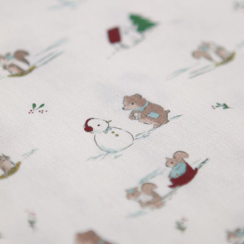 Tissu sergé de coton organique imprimé personnages d'hiver