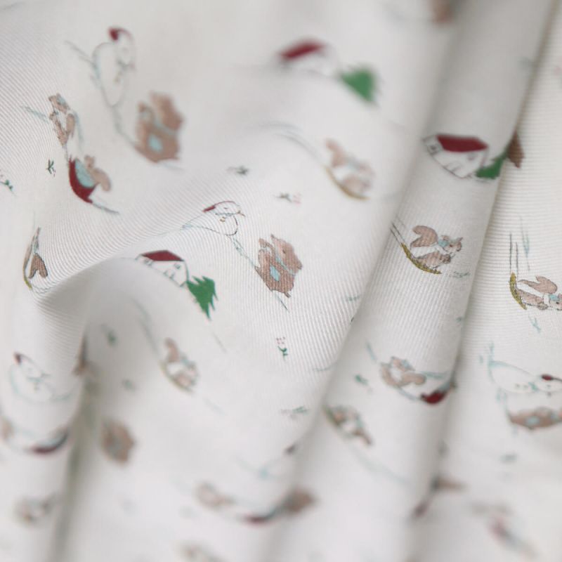 Tissu sergé de coton organique imprimé personnages d'hiver