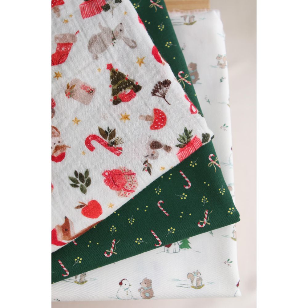 Tissu sergé de coton organique imprimé personnages d'hiver