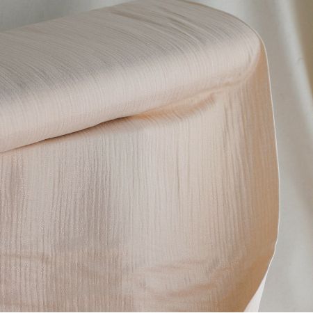 Double gaze de coton crème nude à paillettes