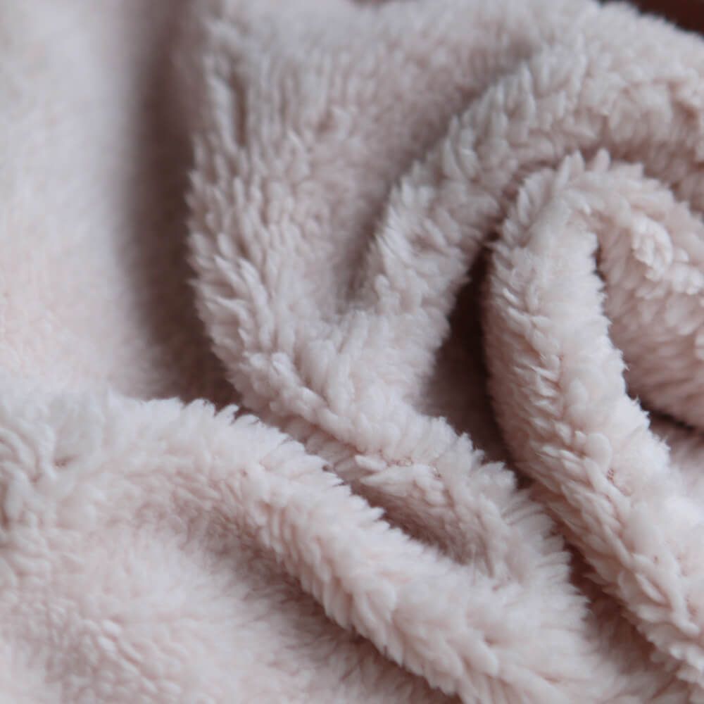 Teddy / moumoute bouclé coloris rose poudré