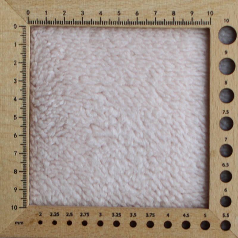 Teddy / moumoute bouclé coloris rose poudré